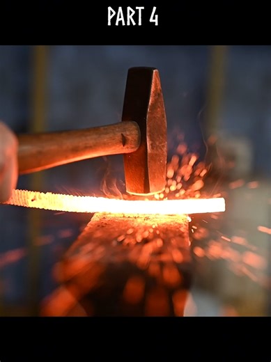 hand forging a Damascus viking axe