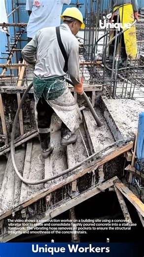 Pouring Concrete Stairs: Construction Worker Using Concrete Vibrator on Formwork