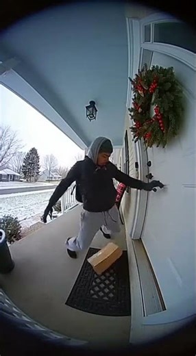 Female Porch Thief Opens Clearly Labeled Bait Box Package