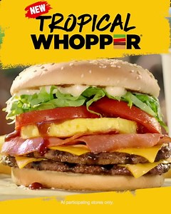 Bite into summer with the NEW Tropical Whopper. 🍔☀️🍍The ultimate summer vibe, with Two Juicy Pineapple Pieces, Double Bacon & Smoky BBQ Sauce. | Hungry Jack's