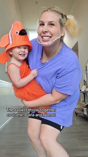 The only thing I had to buy was the fish hat. Such a cute mom and daughter matching costume! And so easy to throw together last minute. #HalloweenCostumeIdeas #MomAndDaughter #FamilyCostume #FindingNemo #DisneyCostume
