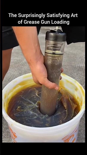 The Surprisingly Satisfying Art of Grease Gun Loading.