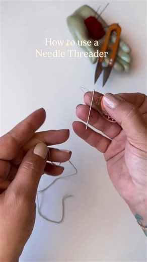 Erin on Instagram: "🪡The Needle Threader: Sometimes I forget not everyone spent their childhood playing in their mom’s sewing basket and have never used or even seen a needle threader before. Which is why I always get a little chuckle when I see posts in various embroidery groups of new stitchers inquiring “what in earth is this for?” with a picture of an old school wire needle threader, not very different than this one I’m using in the video. I used to be super stubborn when it came to threadi