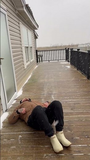 Man Falls on Back While Sliding on Ice - 1631337