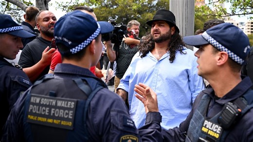 Hundreds farewell Cardinal George Pell at Sydney funeral as police break up clash with protesters