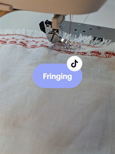 Use the applique stitch on your sewing machine to fringe linen fabric.