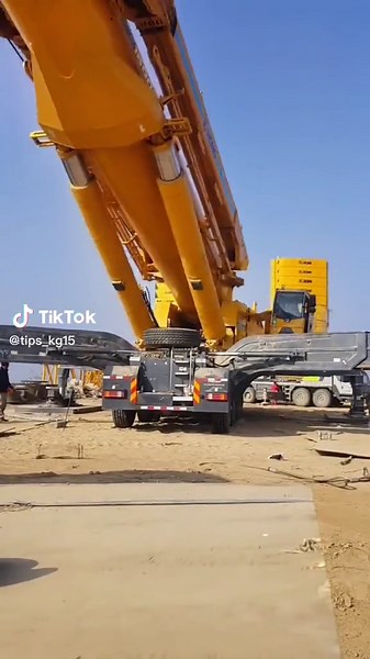 Construction Crane Operation: Lifting Heavy Machinery