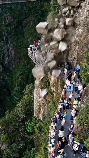 Terrifying Rockfall on Mountain Skywalk! Tourists in Panic During Close Call Cliff Collapse