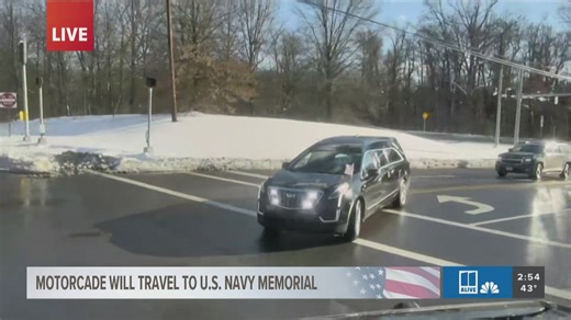 Jimmy Carter's motorcade heads to US Navy memorial