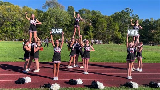 7th grade looked amazing at their game this week!! Check out this strong stunt!! 🖤🤍 | USC Youth Cheer