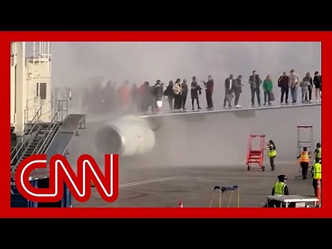 American Airlines plane engine catches fire at Denver airport