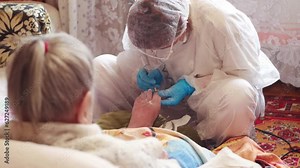 A female podiatrist makes a pedicure on the toenails of an elderly woman. Nail care. Fungus and stratification of nails, onychodystrophy
