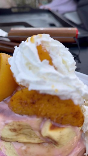 Sunday funday is back with another epic smash cinnamon roll stack! Tag your friends you want to share this with!Smashed cinnamon rolls, strawberry and cream frosting, topped with flambéed bourbon peaches, whip cream and sea salt caramel. 🥃 #sundaybrunch #sundayfunday #sundaybreakfast #breakfastofchampions #cinnamonrolls #cinnamonbuns #Flambe #bourbon #strawberriesandcream #traegernation #reelsvideo #thisjewcanque | This Jew Can Que