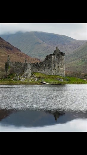 Early morning at Kilchurn Castle on the banks of Loch Awe with just a couple of highland cows, and a few photographers for company whilst waiting for the ‘perfect’ reflection. | Walking Man Photography