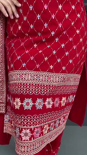 Traditional Red Attire with Intricate Patterns
