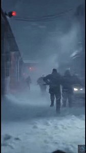 They’re moving too fast. They’re everywhere. Title: Blizzard of the Unknown Description: The storm roars louder. Snow whips sideways, blinding the few remaining figures moving through the swirling darkness. Footsteps crunch in the freezing air. Visibility? Zero. Danger? Everywhere. Tall humanoid figures flicker in and out of the fog, their silhouettes cutting through the whiteout. Their movements too fast to track. Too many. Red emergency lights cut through the chaos. Snowmobiles slide across ic
