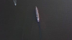 Aerial view of the frigate under sail in the sea