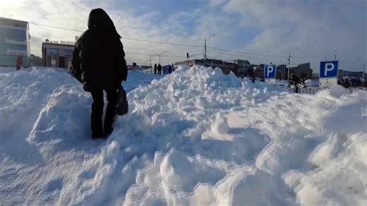 Russians Jump And Ski From Windows As Storm Buries City