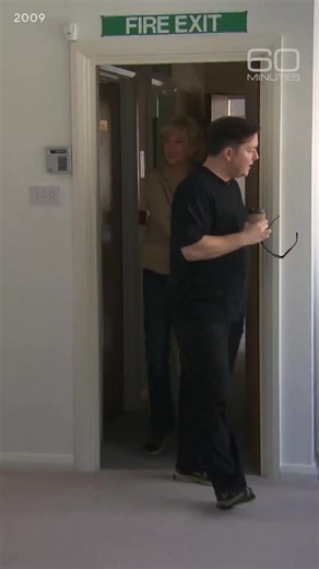 Comedian Ricky Gervais gave 60 Minutes’ Lesley Stahl a tour of his London office in 2009. Inside the dusty room are signs of his drive and success: a life-size “Simpsons” character from an episode he wrote, a poster from a blockbuster he co-starred in, and children’s books he authored. | 60 Minutes