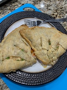 Classic pot pie with a yummy twist Family-favorite comfort food in an easy, yummy baked pocket. #dinner #comfortfood #yum #easyrecipes | Scott & Karen