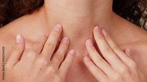 Young woman applying aroma oil on her body shin close up. Skin care, beauty cosmetic treatment, morning routine, beauty products