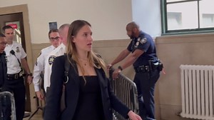 Woman escorted out of courtroom during Trump trial