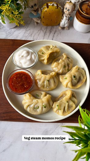Divya on Instagram: "Veg steam momo recipe 😍😍 Save this for later ❤️. Ingredients - 🔸 All purpose flour - 2 cup 🔸 Oil - 1 TSP 🔸 Warm water - ½ cup ( as required) 🔸 Garlic - 5-6 🔸 Green chillies - 3-4 🔸 Onion - 1 🔸 Capsicum - 1 🔸 Grated Carrot - 1 cup 🔸 Cabbage - 1½ cup 🔸 Salt - 1 tsp 🔸 Black pepper powder - 1/2 TSP 🔸 Soya sauce - 1 TSP Steam momos for 12- 15 minutes and enjoy 😍. Do try this recipe and let me know if you liked it or not ❤️. Follow @cookingdiaryathome For more such 