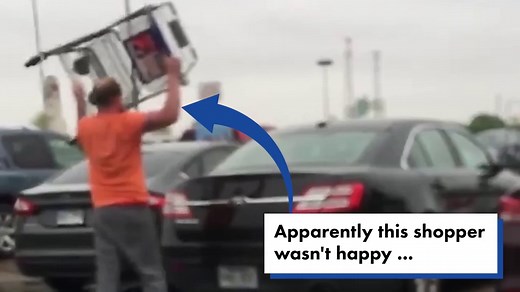 Angry man smashes grocery cart through car window