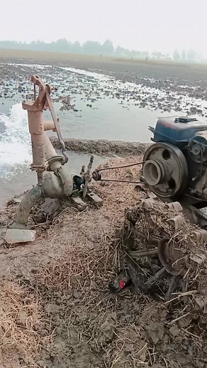 Old Rusty Tractor in Muddy Field Scene