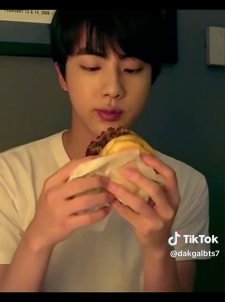 Jin's Joyful Eating Moments: A BTS Mood Booster