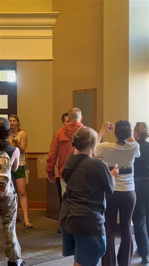 An Ohio University student has now been arrested during the protest at Walter Hall.Students are now all gathered outside the building, where a second student was just taken in cuffs. They have been charged with criminal trespassing.@NewsWatch_WOUB