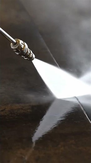 Perfect Power Washing Lines Reveal Flawless Clean Concrete Surface