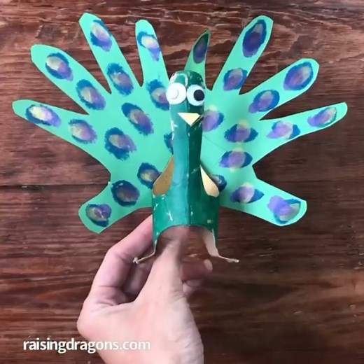 Handprint Peacock Craft 🦚 ages 3 🦚 This adorable peacock craft is so simple to make and is fun to decorate and personalize! Full Details >> https://www.raisingdragons.com/handprint-peacock-craft/ | Raising Dragons - Activities For Kids
