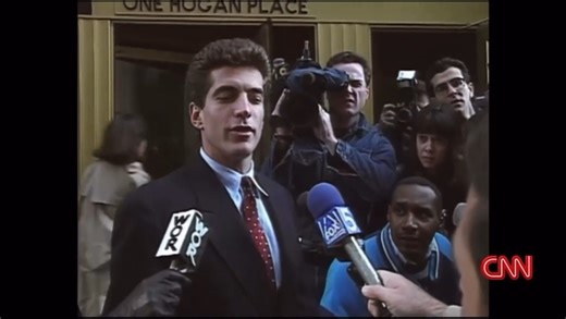 “On July 23, 1990, John took the bar exam for the third time. He received the results on November 3. “The Hunk Finally Does It!,” exclaimed the front page of the New York Post. John invited some people to his apartment to celebrate. Michael Berman was out of town and couldn’t make it, but when he returned a few days later, John had dropped off a couple of bottles of wine with his doorman with a note reading: “From one bar expert to another. Cheers!” John won all six cases that he tried. In his f