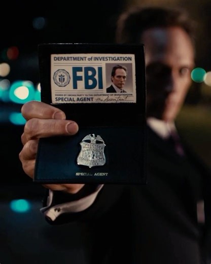 We've seen badass movie tricks, but flipping a coin into an FBI badge?