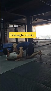 how to choke triangle in grappling? #spartan #spartan313 #spartanmma #triangle #defence