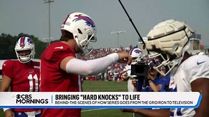 When it launched in 2001, HBO’s “Hard Knocks” helped revolutionize the way behind-the-scenes access was presented to the public. This year’s edition of the acclaimed series will focus on the Buffalo Bills. Nate got a first-hand look at how the NFL team is handling filming during training camp in western New York – and how the team behind the show manages its unprecedented access. | CBS Mornings