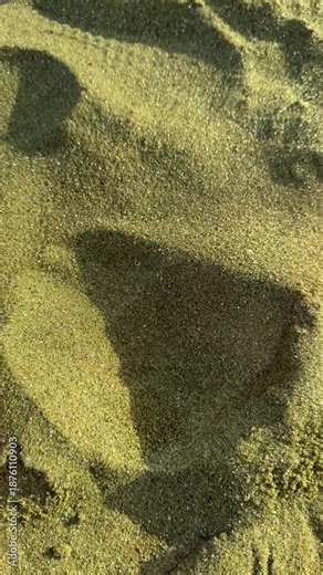 Green sand formed from olivine. Papakōlea Green Sand Beach. South Point (Ka Lae), Big Island of Hawaii