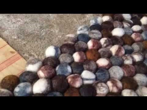 Making a natural pebble stone felt ball rug