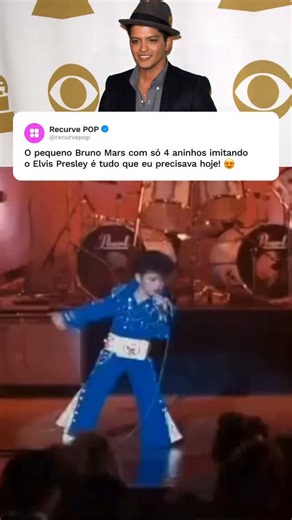 Recurve Pop on Instagram: "Bruno Mars, nascido Peter Hernandez, iniciou sua trajetória artística em Honolulu como o MAIS JOVEM imitador de Elvis Presley do mundo. Aos quatro anos, ele já apresentava uma precisão técnica impressionante em seus movimentos de quadril e no controle de palco, integrando a banda da família, The Love Notes. Em 1992, essa performance mirim ganhou projeção global com sua participação no filme Honeymoon in Vegas (Lua de Mel em Las Vegas), onde interpretou o Little Elvis a
