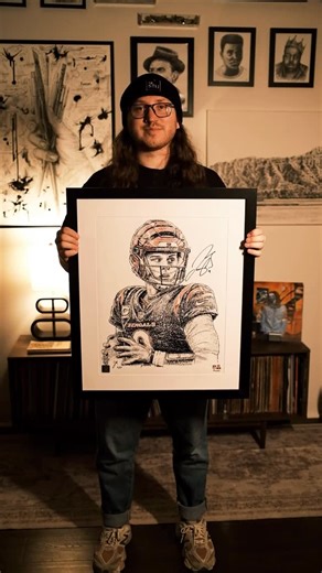 Jayce Hall on Instagram: "13 hours ✍🏼 I am so excited to announce my second collaboration with @fanaticsauthentic ! My favorite parts are the textures in the jersey and how well the orange makes the whole drawing pop 🔥 So glad I got my hands on a signed print 🧡🖤 Which athlete should I draw next? #football #joeburrow #bengals #wordart #micrography #penandink #detail #portrait"