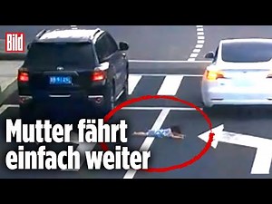 Nicht angeschnallt: Kind fällt an der Ampel aus Auto | China