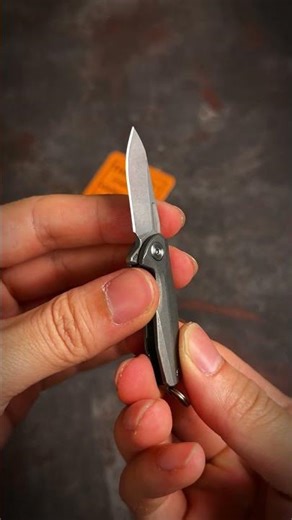 Looking for a micro titanium flipper knife that cuts like a full-size blade?