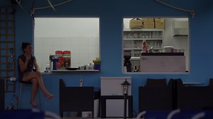 Download Woman smoking and drinking at street coffee bar