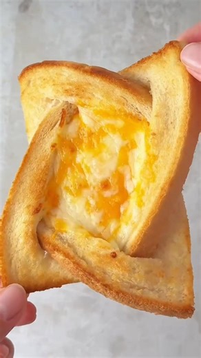 Healthy Bite on Instagram: "Make your cheese on toast more fun by twisting it! Just slice and twist a slice of bread as shown, then fill with plenty of grated cheese. Toast until golden and melted, and enjoy #cheeseontoast #twistedtoast there's something about weaving the cheese with the bread that makes it extra tasty! Just score the centre of your bread and cut a slice of cheese into strips, then weave together. Toast until golden and melted. #cheesetoastie #toastierecipe #elevatedfood #simple