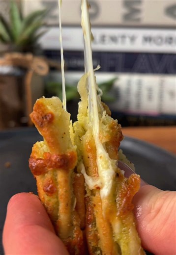 Cheesy herb and garlic tortilla pull apart bread This is not your everyday garlic bread; this is the upgrade that you've been looking for. This recipe takes that standard side dish to a whole new level. If you want to blow minds at your next dinner party or get-together, slide this on the table and mic drop. Full recipe is on my website thechefoutwest:com or link in bio Ingredients 6 white flour tortillas ½ cup olive oil 1 garlic clove ¼ cup fresh basil leaves 1 cup shredded mozzarella ½ teaspoo