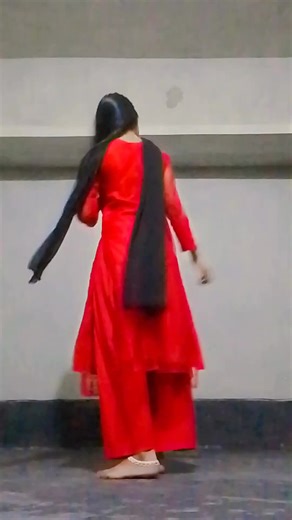 Traditional Dance Performance in Vibrant Red Attire