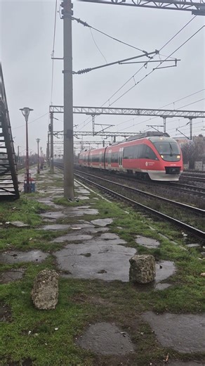 stunning train in the rain.