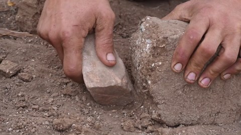 Finishing the Adobe Rocket Mass Heater for the Hut