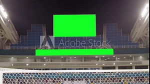 Scoreboard at the Football Stadium with a Green Screen
